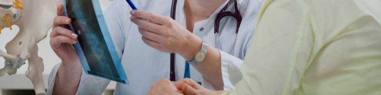 doctor pointing to chart