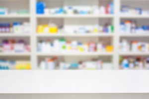 pharmacy-counter-blur-shelves